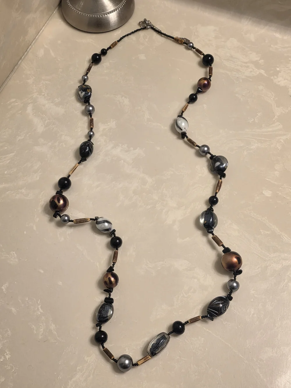 Elegant Multi-Strand Beaded Necklace in Black, Gray, Brown and Gold Tones
